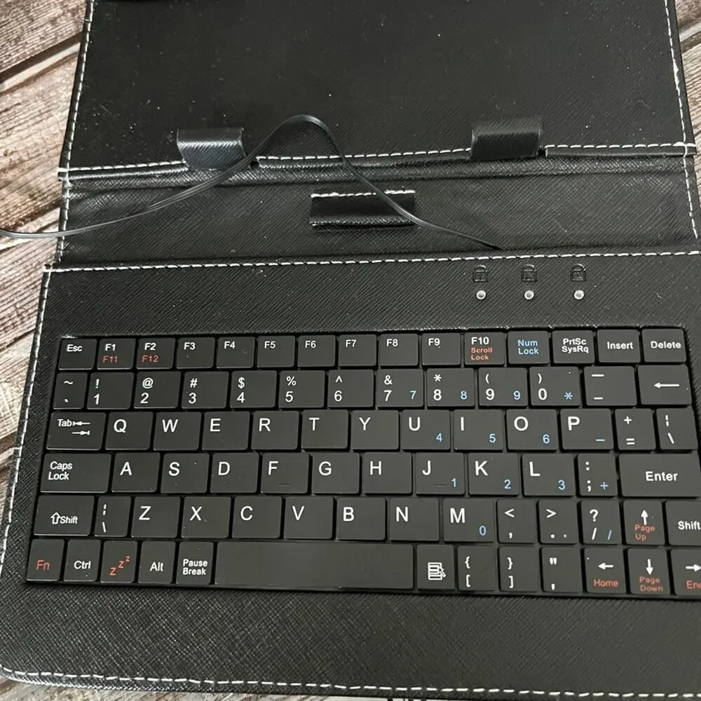 Tablet case and Keyboard. Can hold up to a 9” tablet.